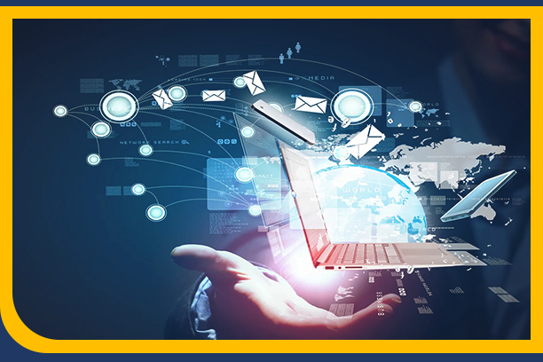 Hand holding an open laptop with glowing screen displaying global communication icons.